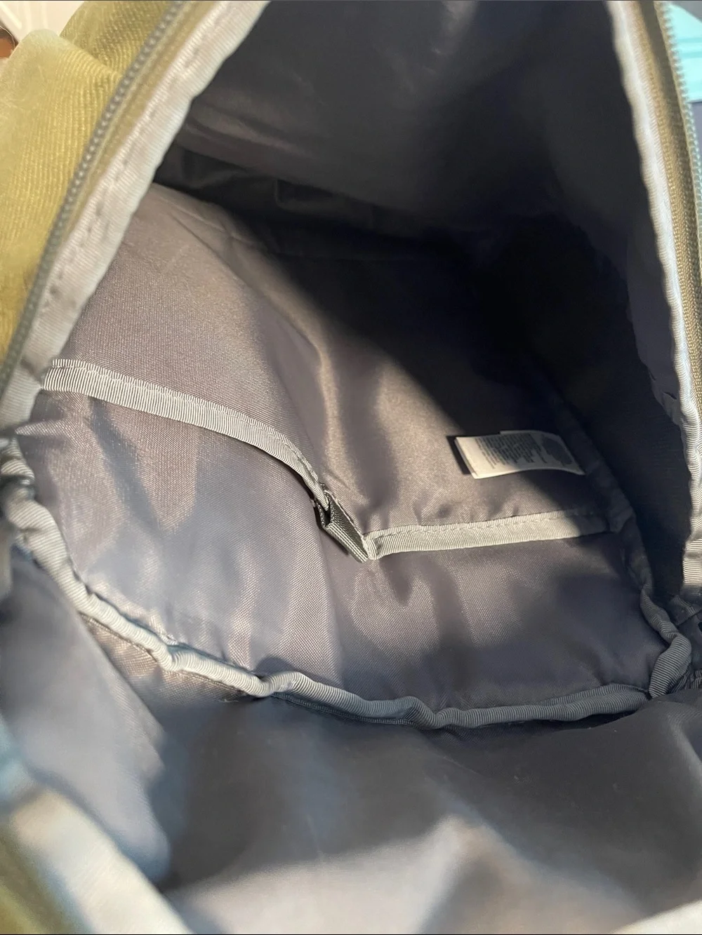 The North Face Olive Green Top Loader Backpack with Yellow Accents